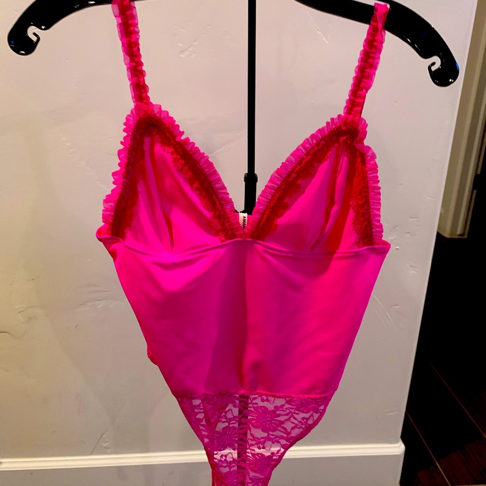 Beautiful Amanda Uprichard hot pink body suit wore it about 3 times max .